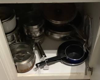 More pots and pans with frying,pans.