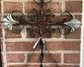 Metal and silver metal cross.