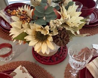 The beautiful Fall centerpiece in breakfast table with sun flowers.