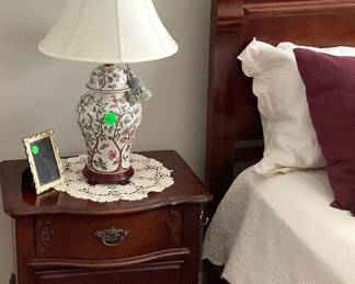 End table with oriental,lamp.