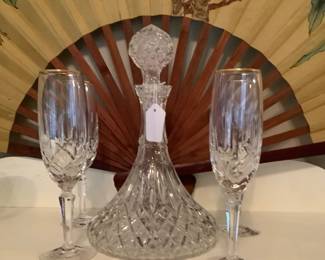 Crystal wine decanter with wine glasses.