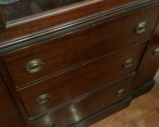 Mahogany China cabinet with glass doors, 3 drawers and 2 doors.
