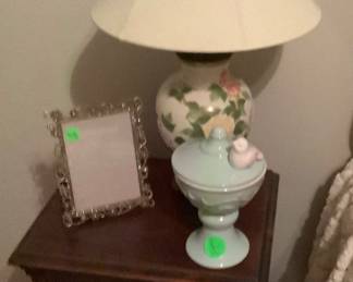A oriental lamp on end table.