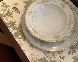 Beautiful Fallsquare p,ace mats with birds holding white yellow and green fine China.