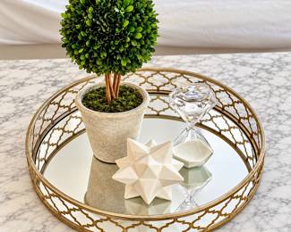 LR Lot #31 - Round Gold Metal Mirror Tray (20”)w/ Decor - White Star Sculpture, Hour Glass, Boxwood Ball Topiary Plant