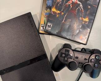 PlayStation 2 with bag and games
