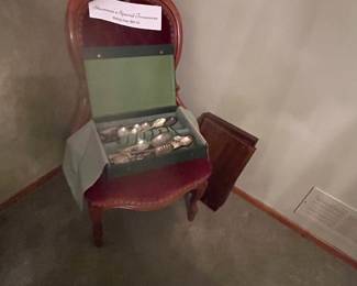 Sitting chair and plated silverware 