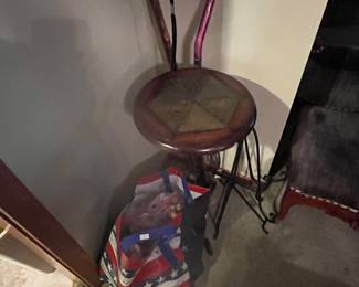 Plant stand, canes, bag of corks 
