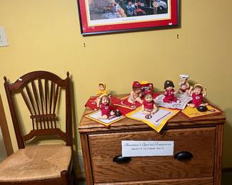 Wooden filing cabinet, vintage chair, chiefs babies, stadium pic