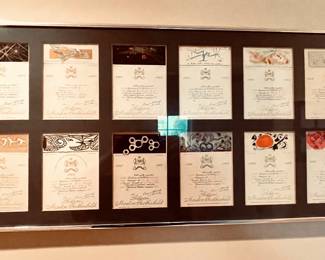 FRAMED COLLECTION OF CHATEAU MOUTON ROTHCHILD ARTIST DESIGNED WINE LABELS