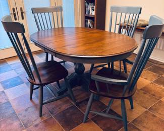 Three dining chairs with matching arm chair