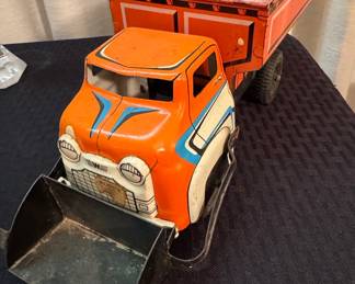 Vintage Wyandotte Pressed Steel Dump Truck with Rose's Store Branding
