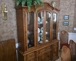 Oak china hutch with lighted glass doors