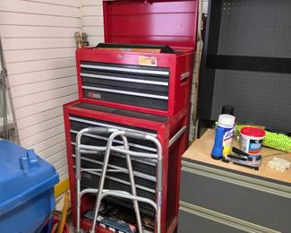 Red rolling tool chest with gray cabinet and walker