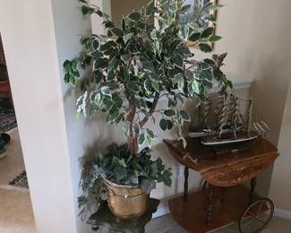 Faux ficus tree, brass planter and tea cart in hall