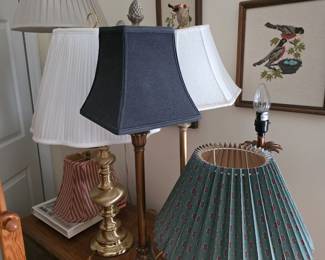 Table lamps with pleated shades and framed bird prints