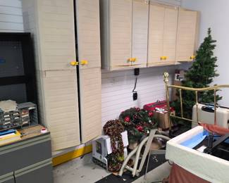 Garage cabinets with holiday items and storage