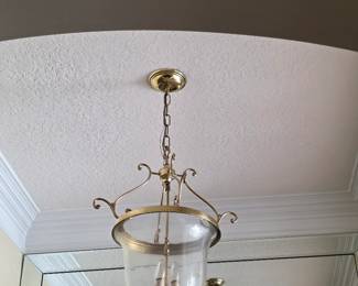 Brass and glass hanging lantern light fixture