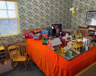 Vintage toys, child's rocking Chair, children's books.  