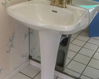 Pedestal sink you must remove yourself. There are two of these.