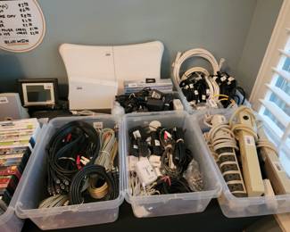 Assorted Electronic Cables, Power Strips, and Adapters