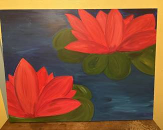 Acrylic or oil painting depicting two red water lilies with green pads on a dark blue water background. The artwork is mounted in a yellow frame.