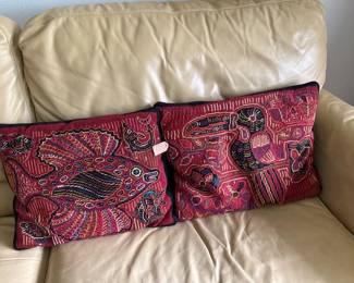 Pair of rectangular throw pillows with a burgundy and black paisley design. The pillows feature a traditional ornamental pattern and appear to be in good condition.