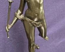 Vintage Fortuana cast bronze sculpture on marble base. 