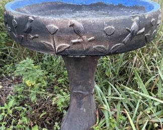 Large concrete birdbath.