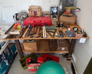 Tool bench, tools, Milwaukee battery operated drill,