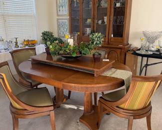 DAVIS FURNITURE CO. dining table, 3 leaves, table pad along with 4 GRAND LEDGE CHAIR CO. chairs.  DAVIS FURNITURE CO. China cabinet.