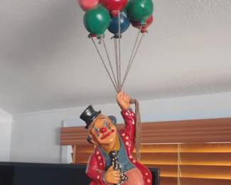Vintage Clown Sculpture with Balloons