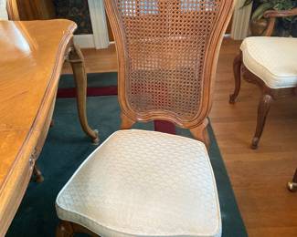 Cane back chairs with back cushion removed