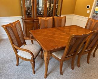 vintage Thomasville Furniture dining room table and cane-back chair set