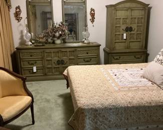 Triple dresser, double mirror on wall full-size bedroom set