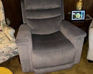 This is a Moto motion lift recliner fairly new. Can sell it now for 700.