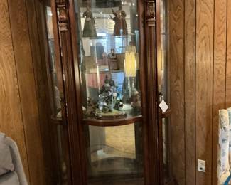 A beautiful Pulaski curio cabinet it has numbered pieces of God‘s children