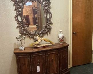 Mid-century modern credenza, with a rococo mirror above