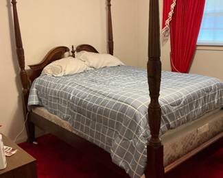 This rice four poster bed comes with a mattress and boxspring