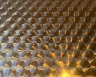 Surface of metal table