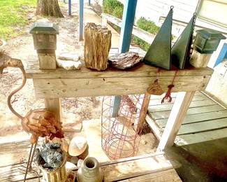 Petrified wood pieces, yard decor and sturdy wind chimes.