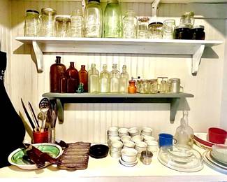 Enough vintage and collectible jars and bottles to fill a pantry.
