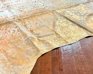 #26 - $150 -Cow hide with mettalic gold splash 76x70