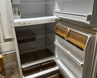 Free white fridge and freezer in garage! Works great but needs cleaning
