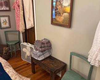 Vintage painting on cloth. Check out those cute corner chairs