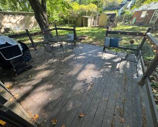 Wrought iron black patio table and 4 chairs set, 2 extra chairs