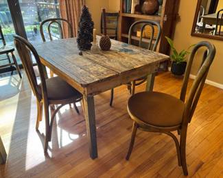So many good ol tables here! There are 9 bentwood chairs total, 5 of them have matching seats