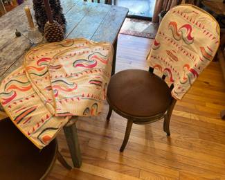 We found adorable vintage/retro (linen&nbsp;with piping)&nbsp;slipcovers for the Bentwood chairs. 4 of them. See picture! True find