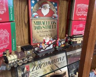 Holiday train set w/ more in boxes on shelf, Collectibles