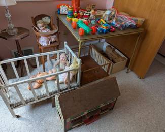 Vintage toy crib, dolls, high chair, play pen, blocks, wooden toys and more not pictured